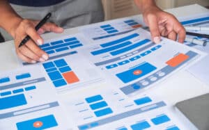 Website designer Creative planning application developer development draft sketch drawing template layout prototype framework wireframe design studio . User experience concept .