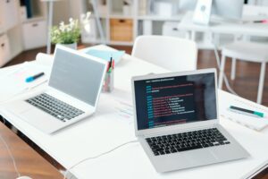 two laptops on web development