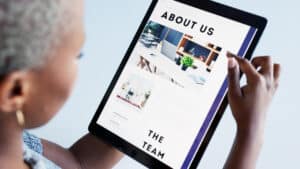 Marketing, advertising and tablet with a business woman or graphic designer working on a presentati.