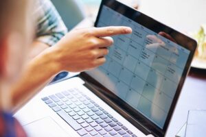 team discussing content calendar schedule