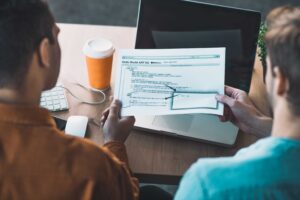 two people discussing website schema markup