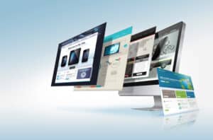 A computer monitor displays multiple overlapping website interfaces, illustrating Web Design in Northeast San Antonio and development concepts on a light gradient background.