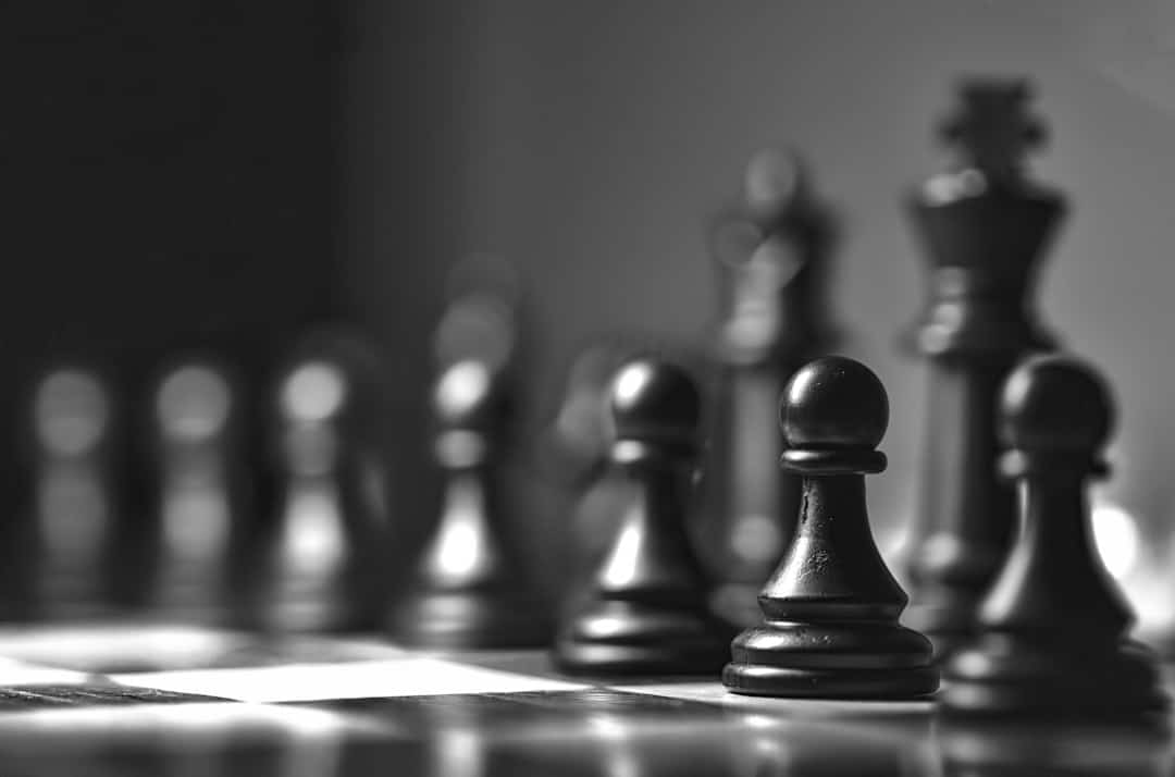 Chess pawns on a board, representing marketing strategy and sequencing