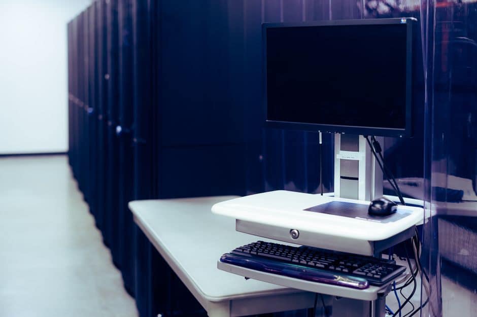 Monitoring workstation at the end of a server aisle inside a data center