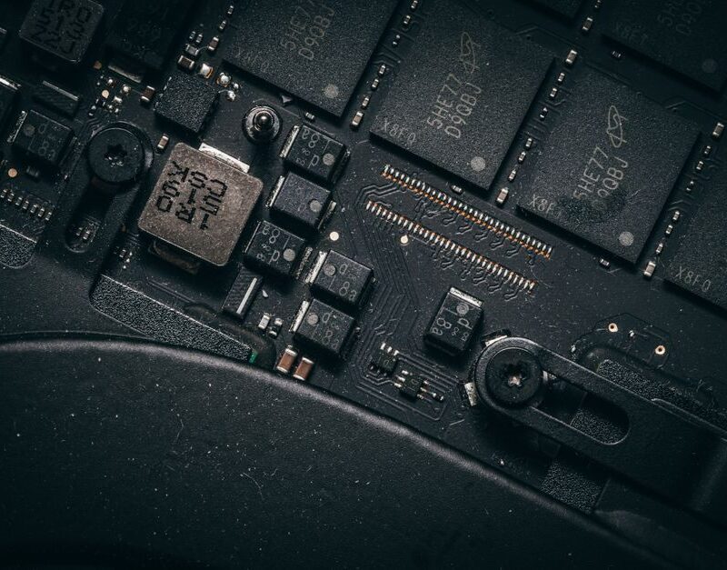Macro view of a circuit board showing processors and memory chips